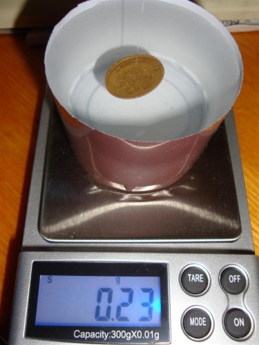Gold_coin_water.JPG